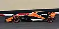 In 2017, McLaren chose to return to an orange livery on the McLaren MCL32, while keeping the black prominent. Fernando Alonso is seen testing the car at the Circuit de Barcelona-Catalunya.