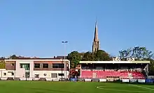 Church spire behind Meadowbank Stadium