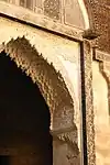 Detail of the muqarnas arch leading to the prayer hall