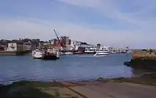 The river's mouth at Cowes, looking west, with the chain ferry in mid-stream