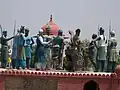 Sculpture of the execution of Bhai Mati Das by being sawn in half at Mehdiana Sahib