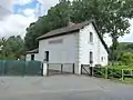 The surviving station building at Merck-Saint-Liévin.