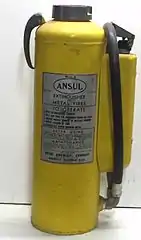 Ansul Met-L-X cartridge-operated dry powder fire extinguisher for class D fires, 1950s