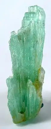 Metavauxite, a rare member of the vauxite group. Siglo XX Mine, Llallagua, Bolivia. Size: 4.2 x 1.2 x 1.1 cm.