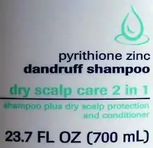 White shampoos label measuring 23.7 FL OZ (700 mL)