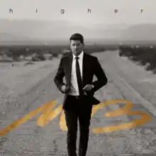 A black-and-white image of man wearing a suit while walking on a desert road. The album title is above the man, while the artist's logo is behind him on the road, colored in black and gold respectively.