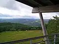 View south, over the edge of the plateau and towards the Cantal mountains.