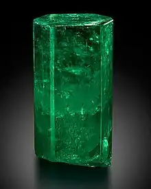 Large, di-hexagonal prismatic crystal of 1,390 carats uncut with a  deep green color. It is transparent and features few inclusions in the upper 2/3, and is translucent in the lower part. Housed at the Mim Museum, Beirut, Lebanon.