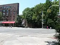 View from Minetta Street looking south across Sixth Avenue at Downing Street; both Minetta Street and Downing Street are built on top of the Minetta Creek riverbed