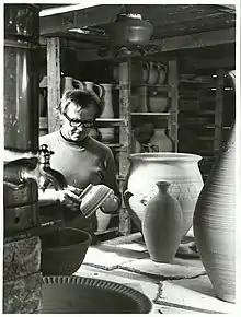 Mirek Smisek examining a pot, January 1973