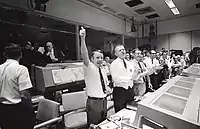 Mission Control celebrates the successful splashdown