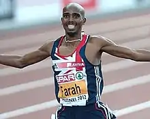 Photo of Mo Farah spreading his arms