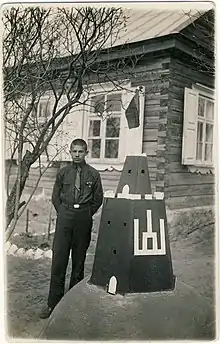 A Lithuanian scout Liudas Tarabilda with a model of the Gediminas Tower (a campaign of the Union for the Liberation of Vilnius) in the yard of his school in Anykščiai (1932)