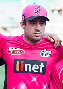 A man in a blue Indian jersey.