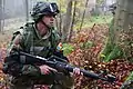 Image 10A soldier from Moldova pulls security while conducting a company situational training exercise during exercise Combined Resolve III at the Joint Multinational Readiness Center in Hohenfels, Germany, Oct. 26, 2014