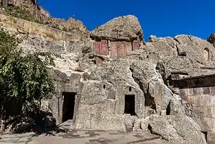 Khachkars inset in rock outcropping