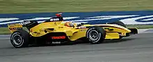 Tiago Monteiro in the EJ15 at the 2005 United States Grand Prix, this time with the Sobranie livery applied to the rear wing.