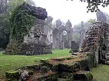 Ruined church at Montfaucon-d'Argonne directly behind the monument. The blocky structure on the left is a German World War I observation post.