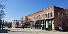 Two-story brick buildings.