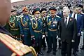 President Putin greeting the commanders of parade formations.