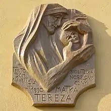 Outdoor bas-relief plaque