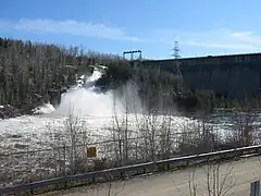 Mountain Chute Dam with spillway sluice gates open