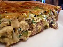 slice of quiche with light brown filling