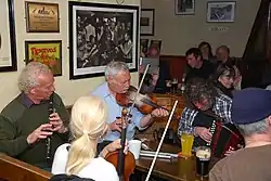 Image 37Irish traditional music sessions usually take place in public houses (from Culture of Ireland)