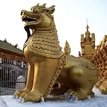 Image 27Sculpture of Myanmar mythical lion (from Culture of Myanmar)