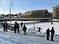 People watching the closed Myllysilta.