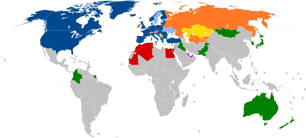 A world map with countries in blue, cyan, orange, yellow, purple, and green, based on their NATO affiliation.