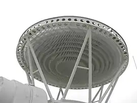 The TTR and MTR radars used a Fresnel lens made of thin metal plates arranged in a frame. The feed horn is at the bottom of the A-shaped supports.