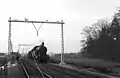 NS 6106 with a goods train during electrification work. (1952)