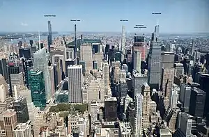 View of Midtown Manhattan in September 2023, looking north from the Empire State Building's 102nd floor (1,224 feet or 373 meters above ground level). 111 West 57th Street is labeled as "Steinway Tower".