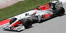 Narain Karthikeyan driving for HRT at the 2011 Malaysian Grand Prix.