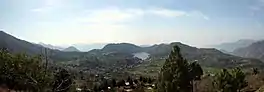 A panoramic photo of the Naukuchiatal Lake in Uttarakhand, India