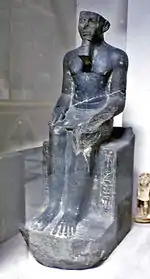 Statue of Mersekhemre Neferhotep II, who could be the same person as Mersekhemre Ined. Discovered in the Karnak cachette, now on display in the Egyptian Museum, CG 42024.