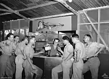 RAAF No. 12 Squadron pilots in the mess at Merauke in December 1943