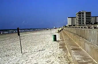 Seawall on North Padre Island constructed in the backbeach to protect condominiums from storm waves and beach erosion. Central Texas