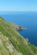 View of Arapawaiti Point and the steep cliffs on the north side of the island