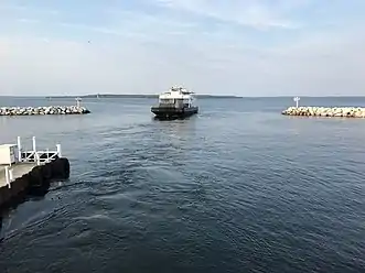 The Washington leaves the ferry dock at Northport.