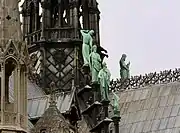 Three apostles with St. John's eagle in the foreground