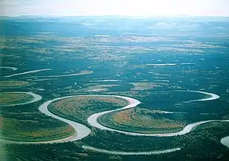 Image 22The Nowitna River in Alaska. Two oxbow lakes – a short one at the bottom of the picture and a longer, more curved one at the middle-right. (from Lake)