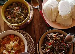 Image 1Nshima (top right corner) with three types of relish. (from Zambia)