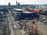 View of crash site during the clear up, showing the extent of damage to the surrounding infrastructure.