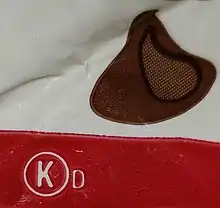 A bag of chocolate chips with a circled letter K on it, the symbol of OK Kosher Certification