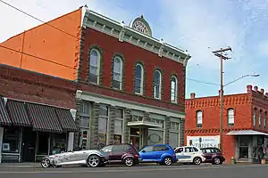 Downtown Oakland and cars of the local PT Cruiser Club