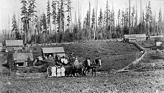 Settlers at their homestead on the west side of Oakville, circa 1890.