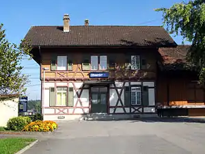 Two-story building with gabled roof