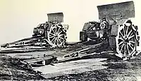 Two mortars with Bonagente grousers.  A pit could be dug beneath the breech for high-angle fire.